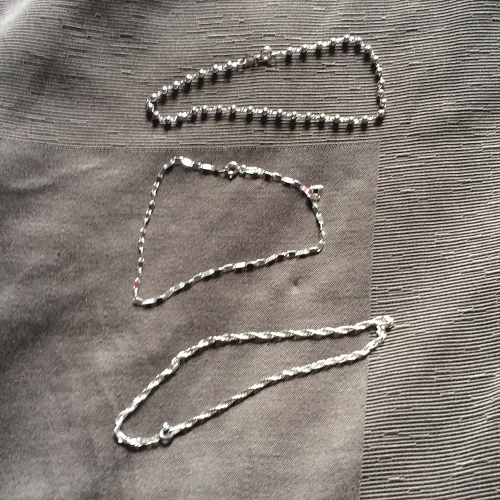 Three brand new silver bracelets
